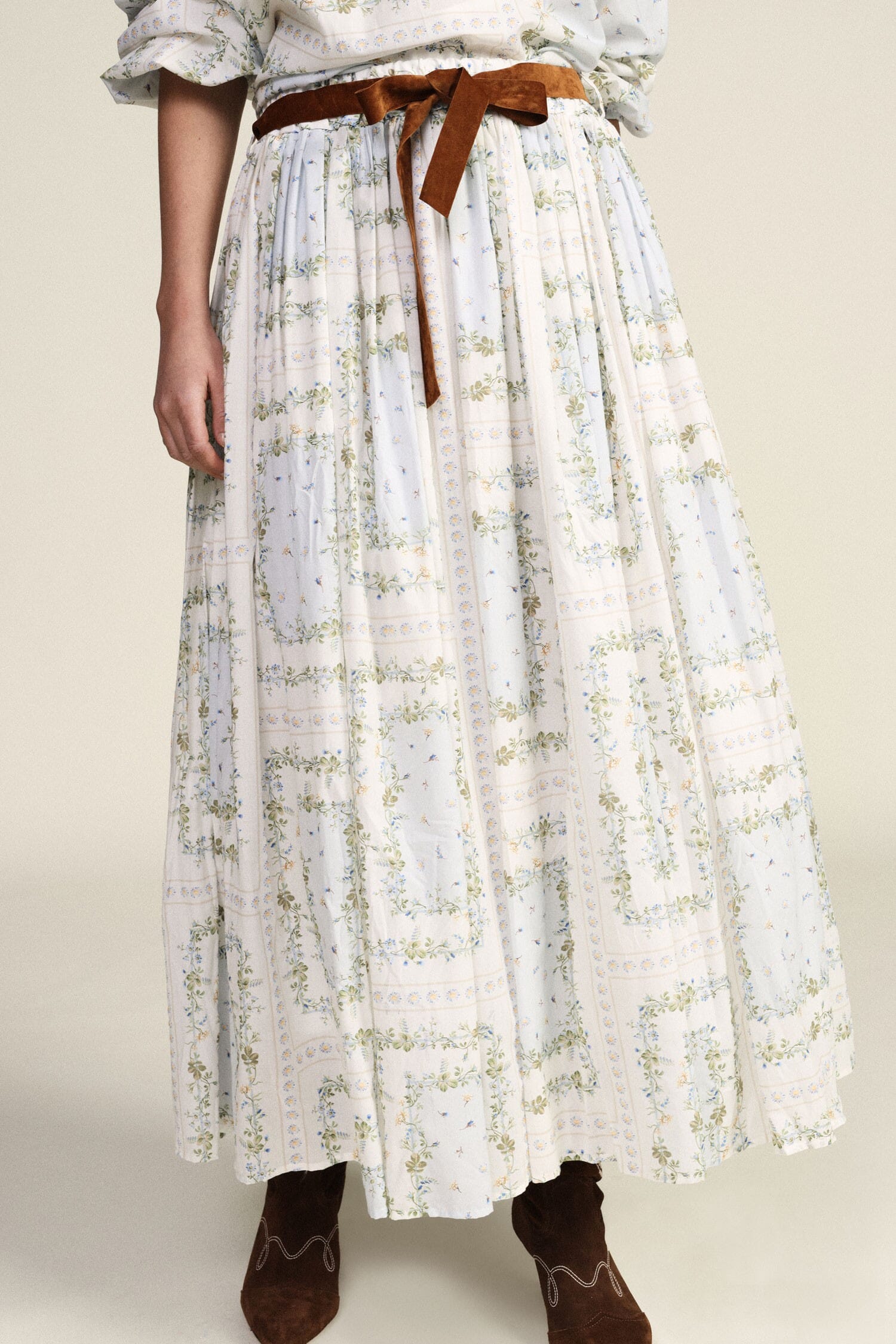Jupe plissée à imprimé floral et ceinture à nœud Dixie