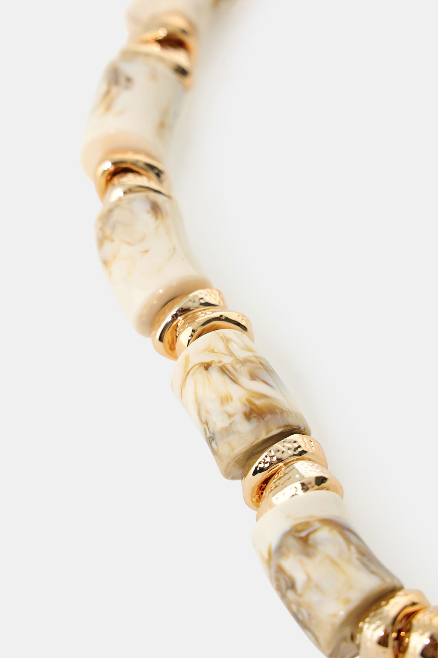 Bracciale Elastico Con Cilindri Marmorizzati E Inserti Metallici Dixie