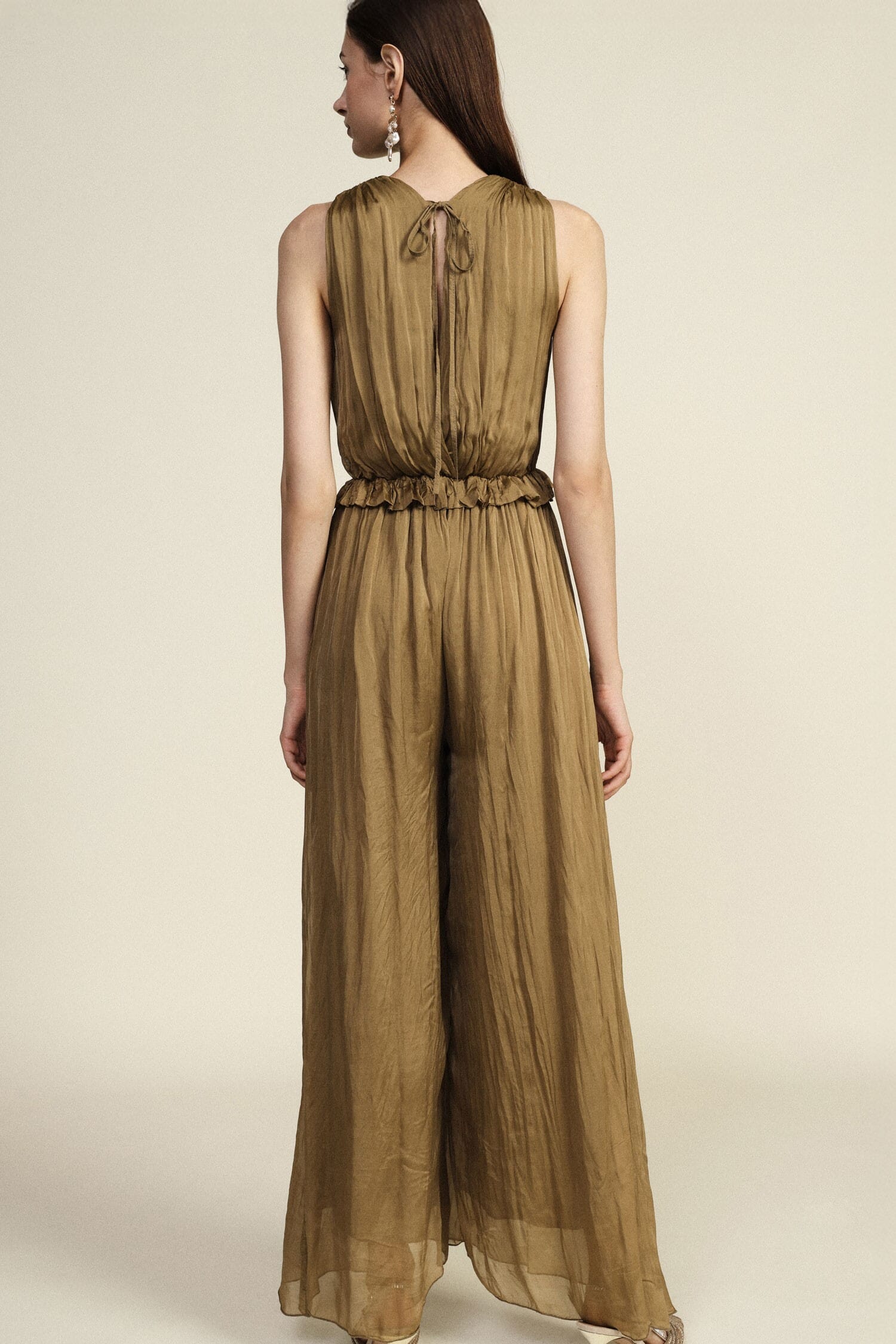 Long Jumpsuit With Deep Neckline And Curled Belt Dixie