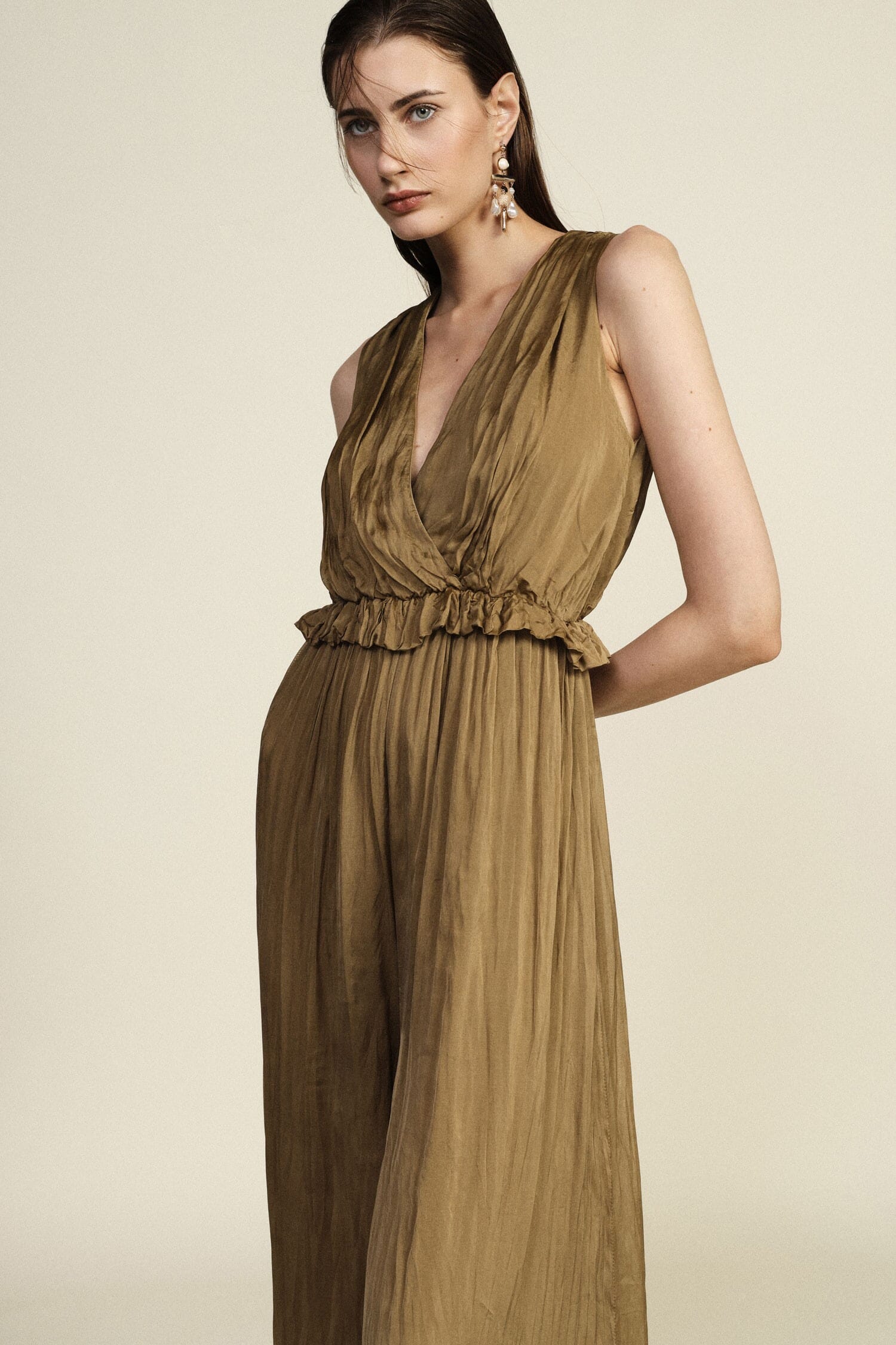 Long Jumpsuit With Deep Neckline And Curled Belt Dixie