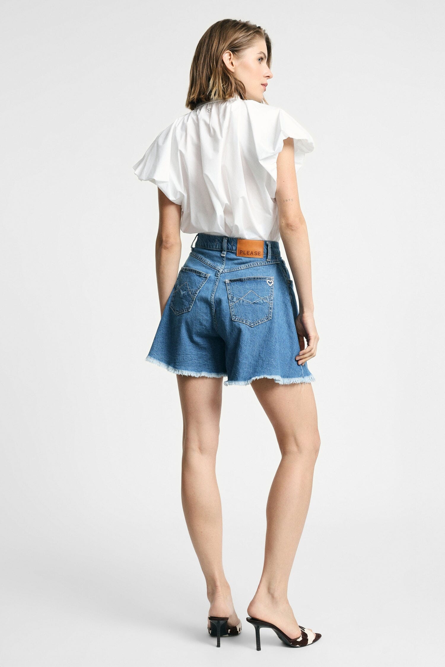 Jupe évasée Short à effet avec ourlet effiloché Please
