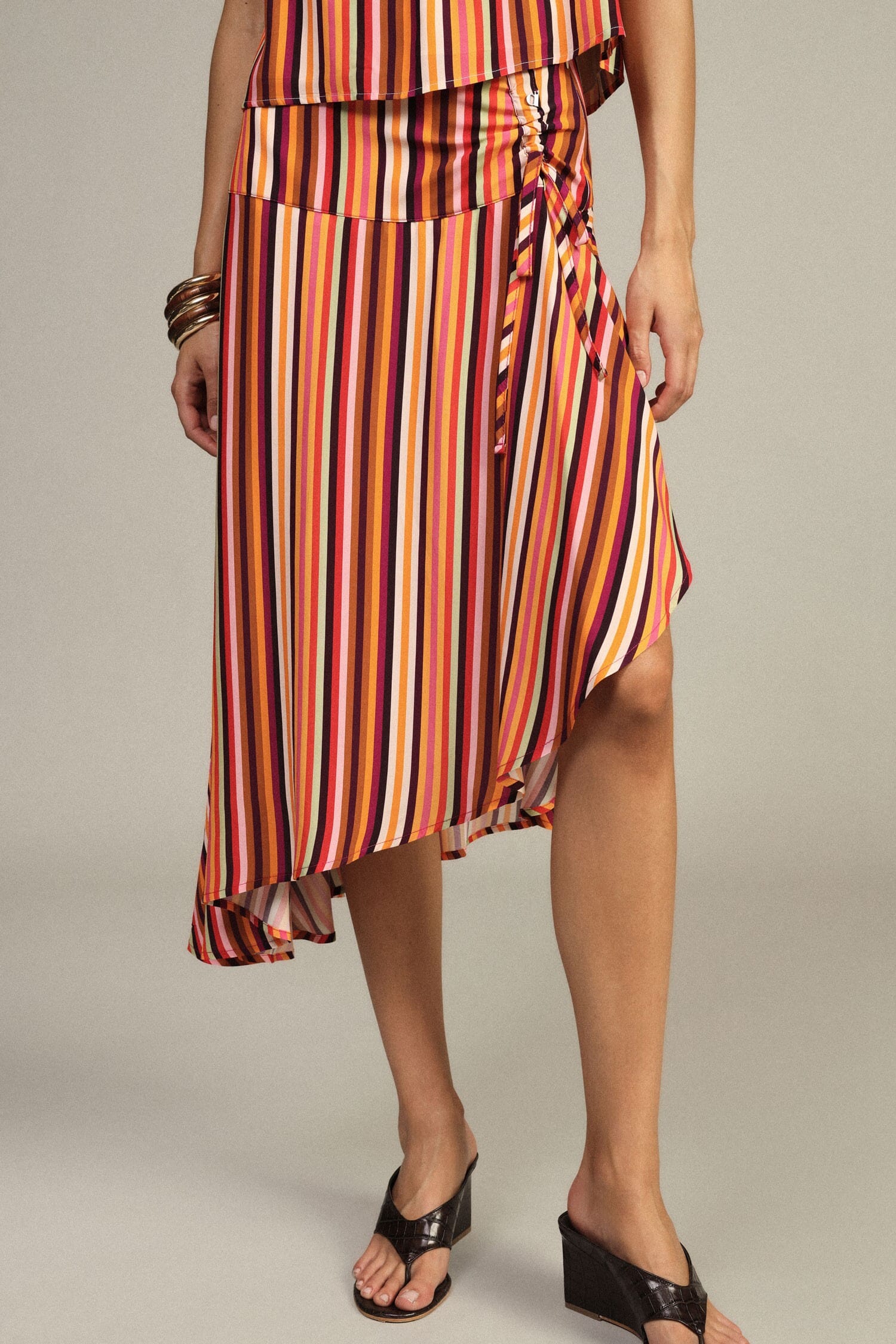 Short, Asymmetrical Striped Skirt with a Dixie Knot