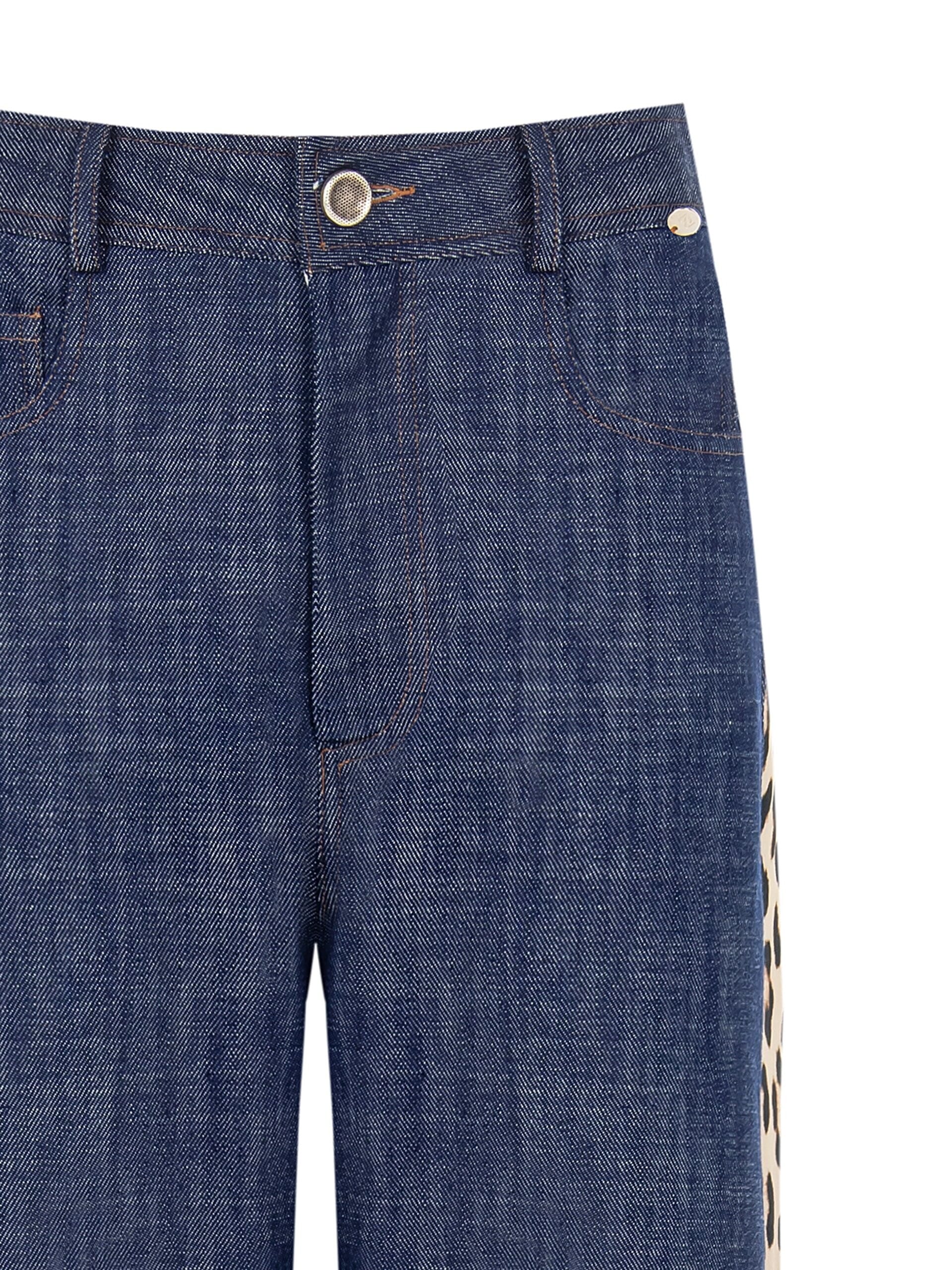 Jeans Palazzo Svasati Con Banda Laterale Maculata Rinascimento