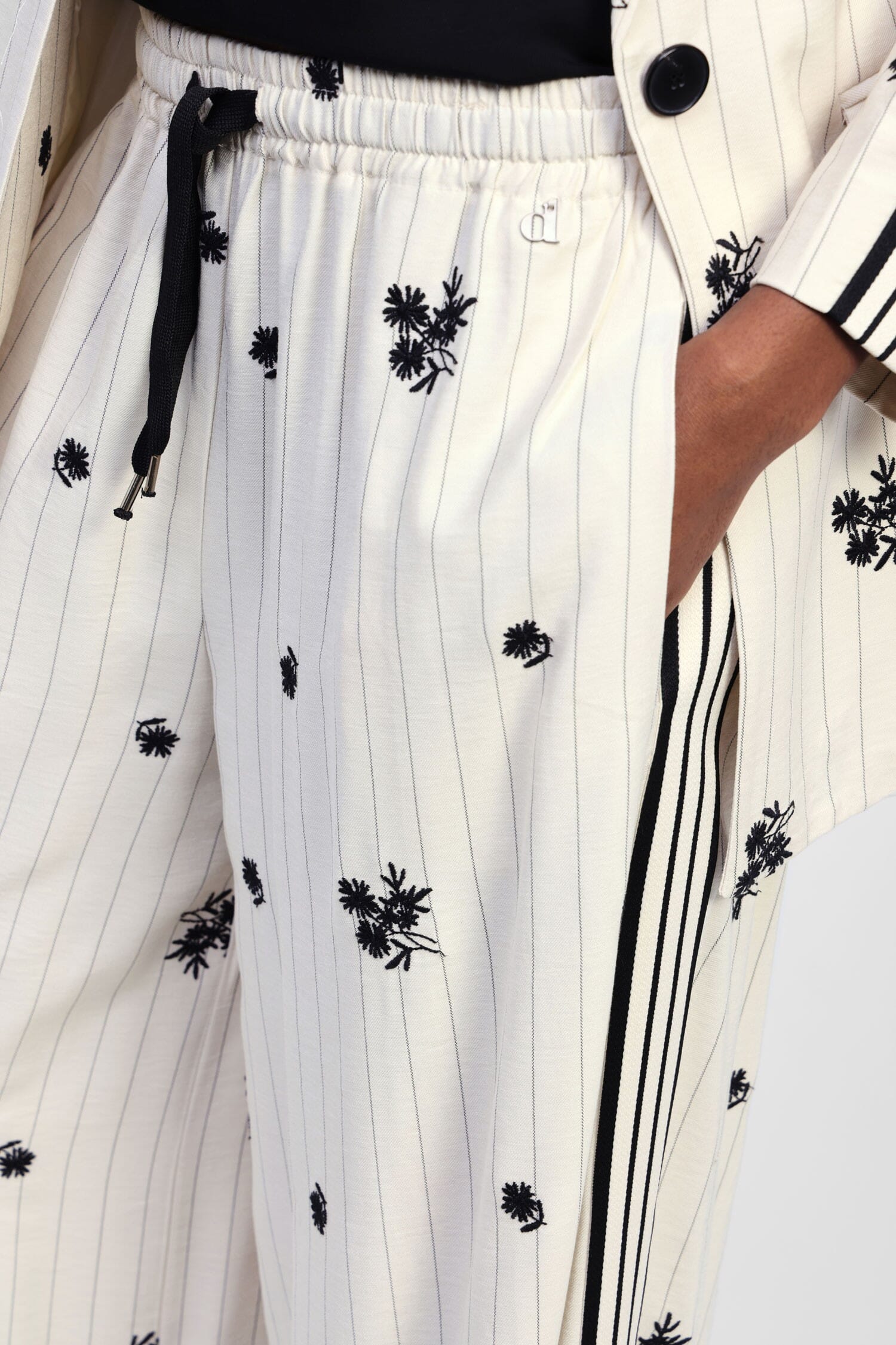 Pantalon ample avec rayures et motif floral Dixie