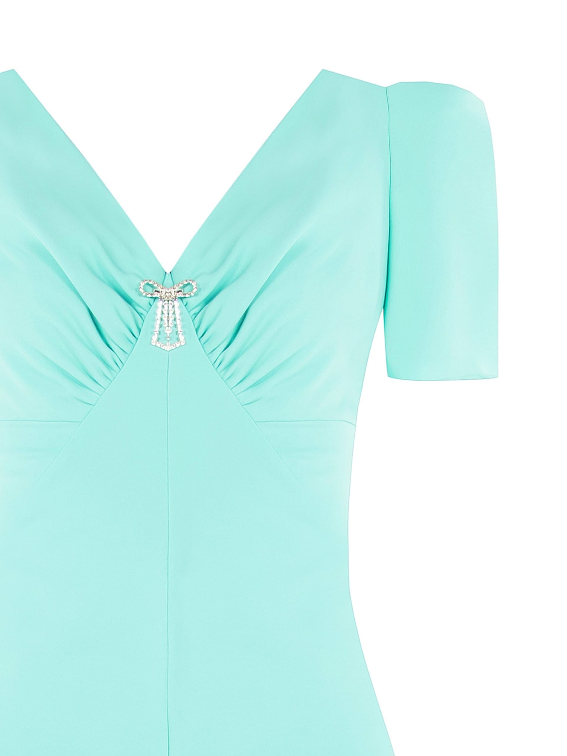 Combinaison intégrale en tissu fluide avec double encolure en V et broche nœud en strass Rinascimento