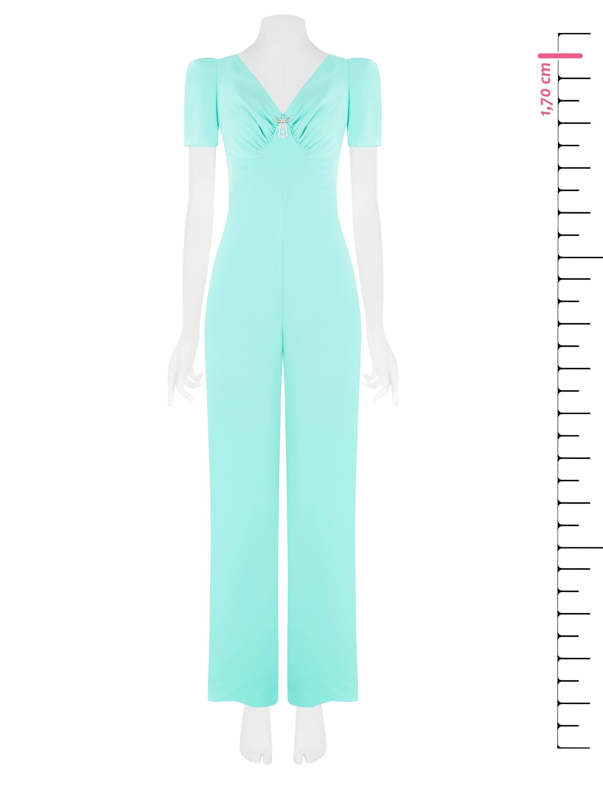 Combinaison intégrale en tissu fluide avec double encolure en V et broche nœud en strass Rinascimento