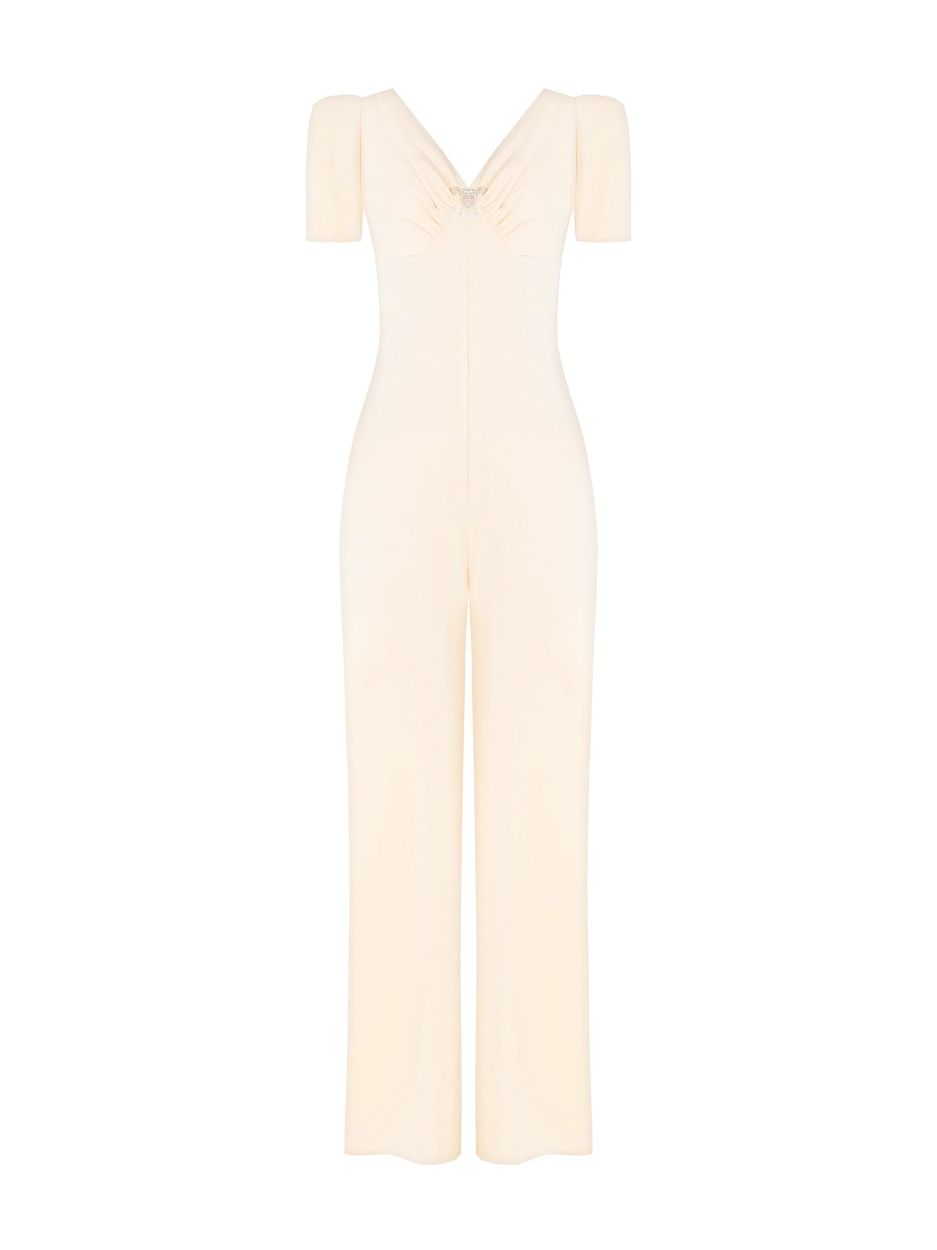 Combinaison intégrale en tissu fluide avec double encolure en V et broche nœud en strass Rinascimento