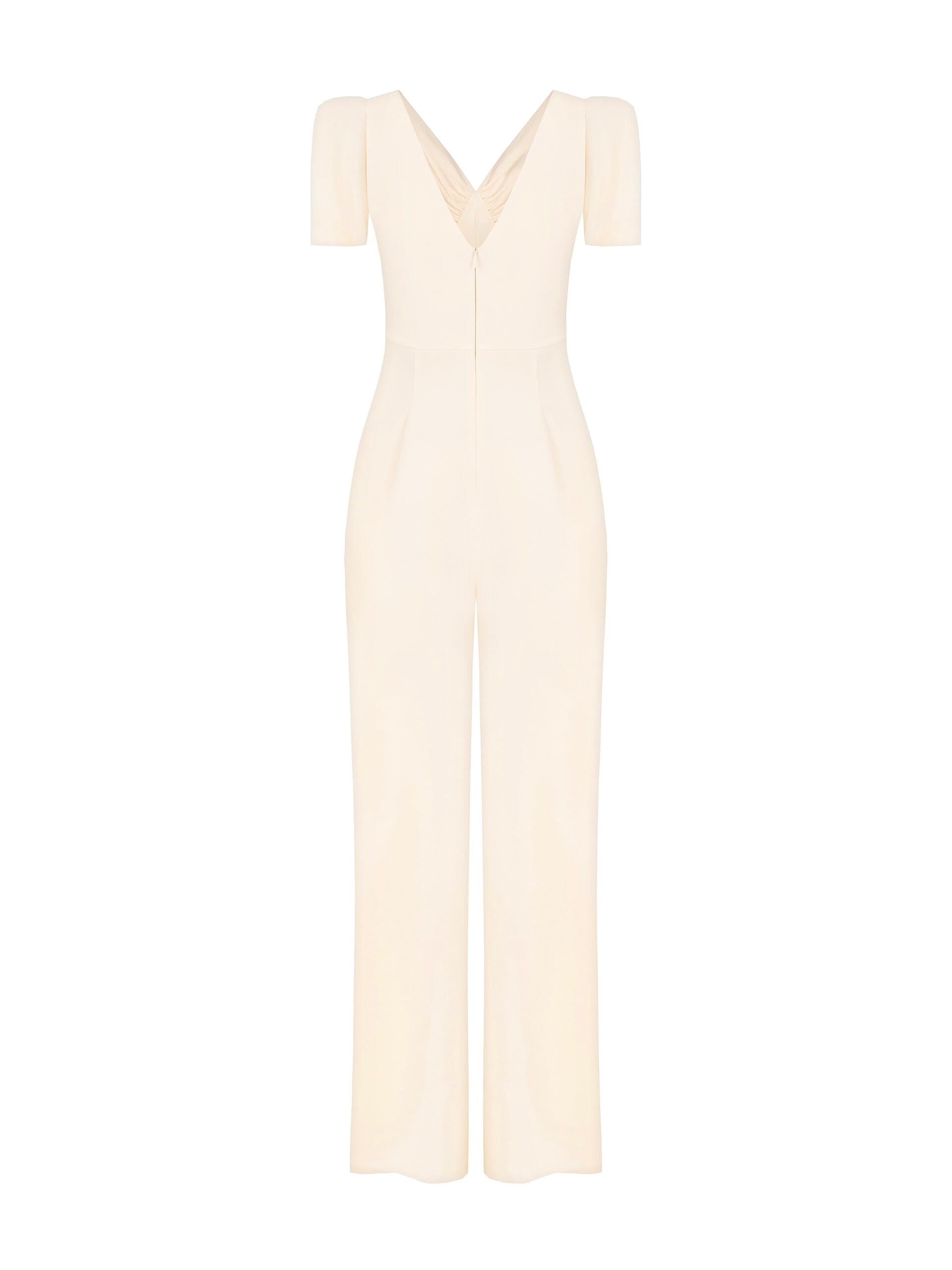 Combinaison intégrale en tissu fluide avec double encolure en V et broche nœud en strass Rinascimento