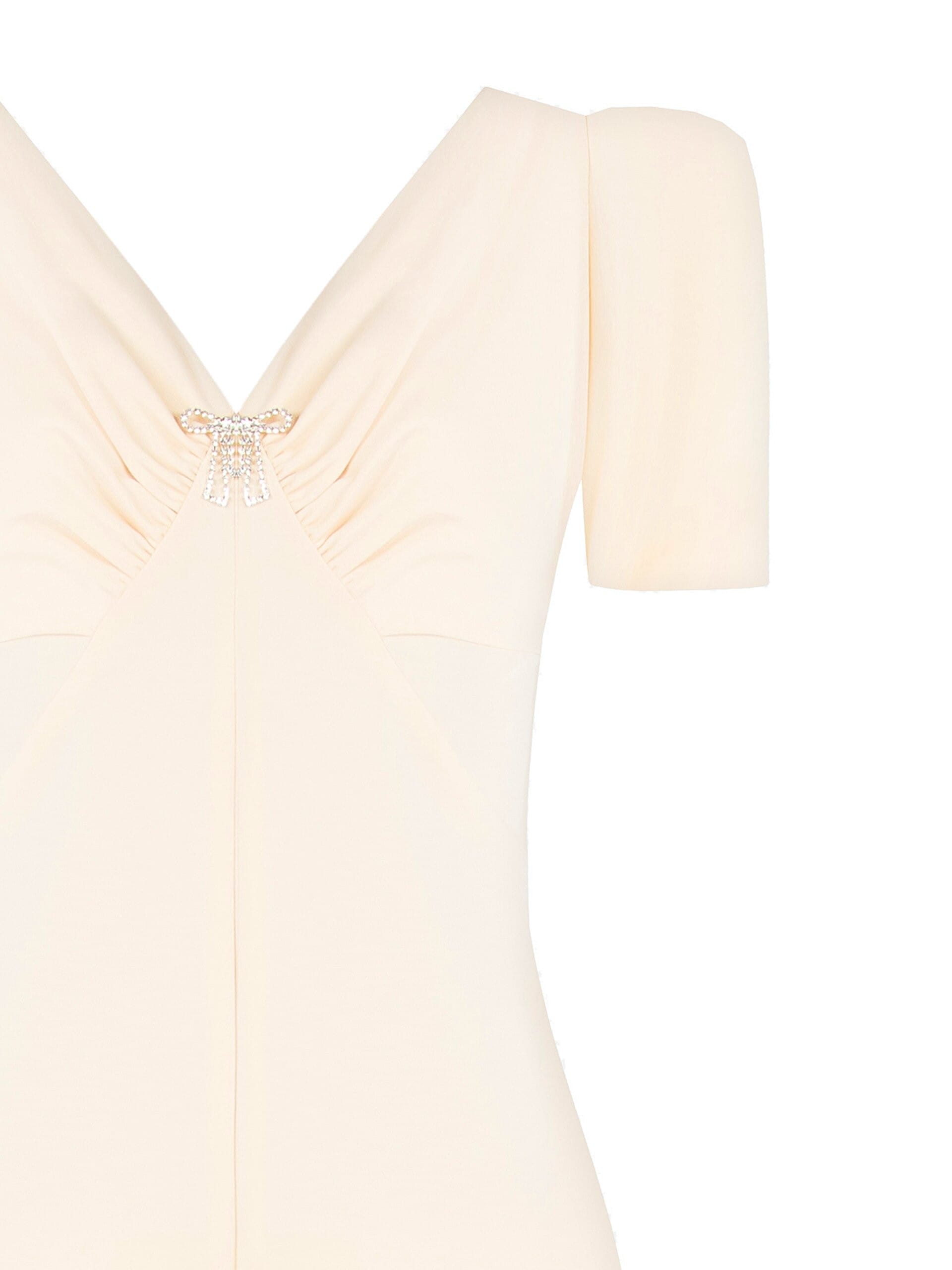 Combinaison intégrale en tissu fluide avec double encolure en V et broche nœud en strass Rinascimento