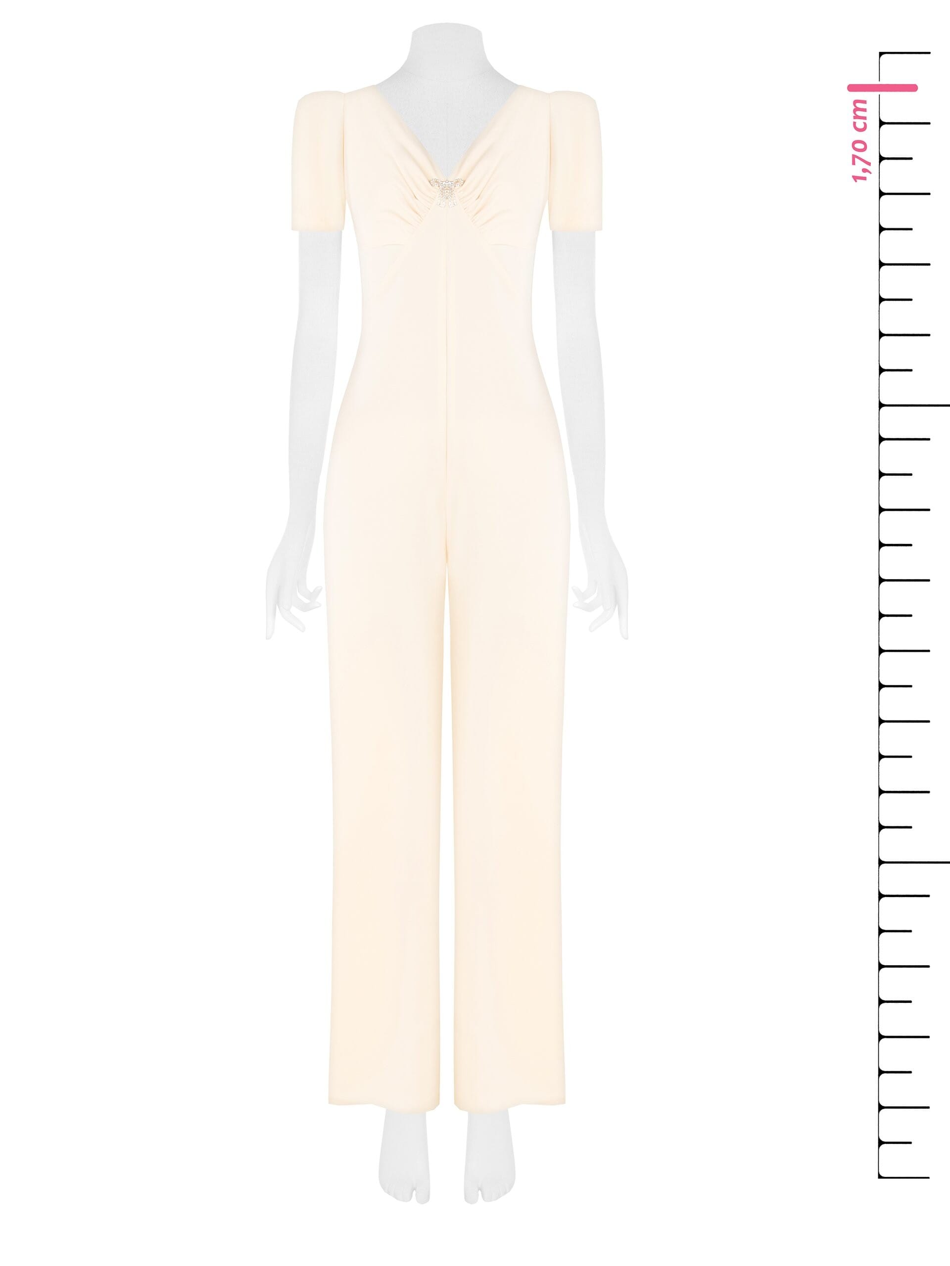 Combinaison intégrale en tissu fluide avec double encolure en V et broche nœud en strass Rinascimento