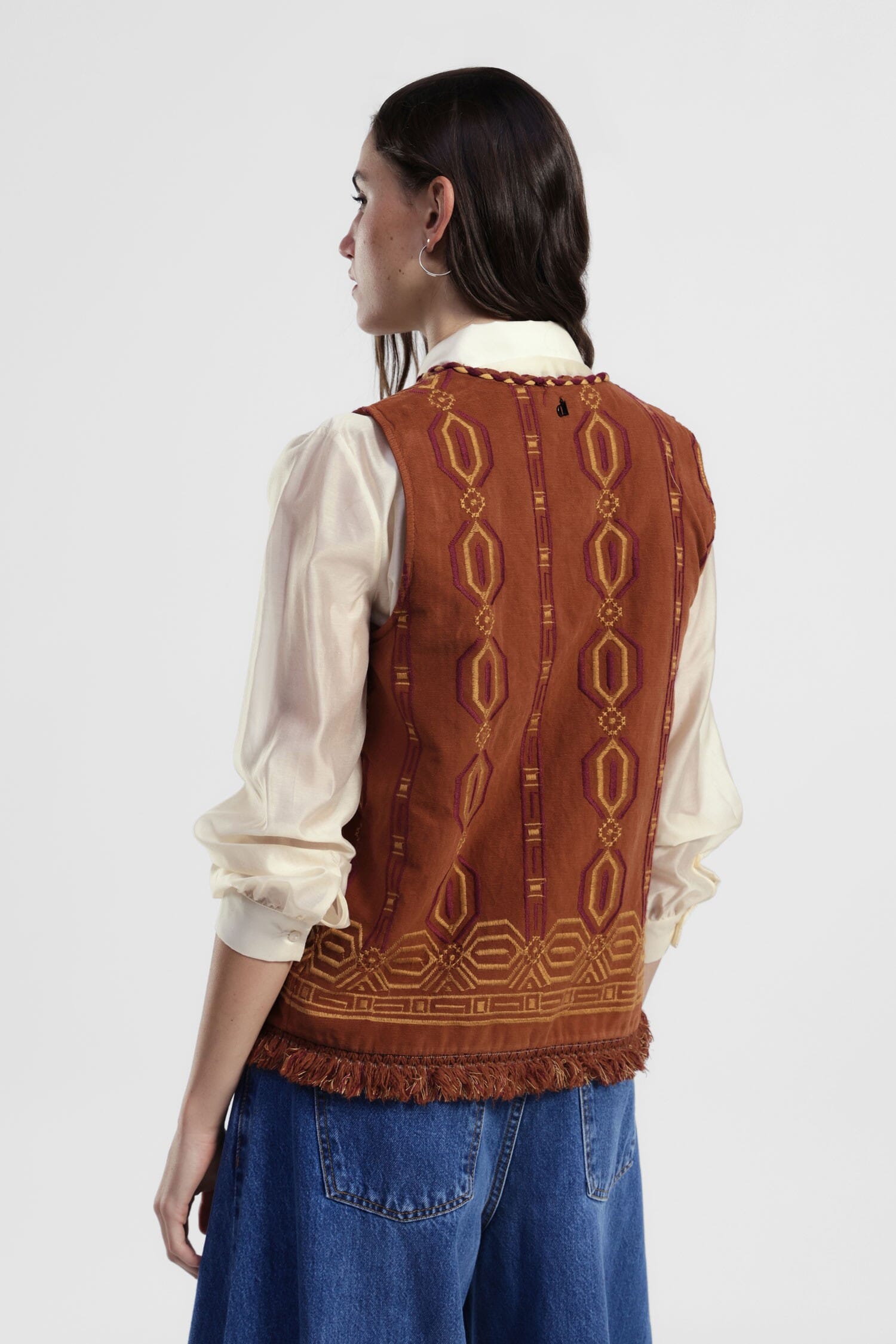 Gilet Fantasia Geometrica Con Frange Sul Fondo Dixie