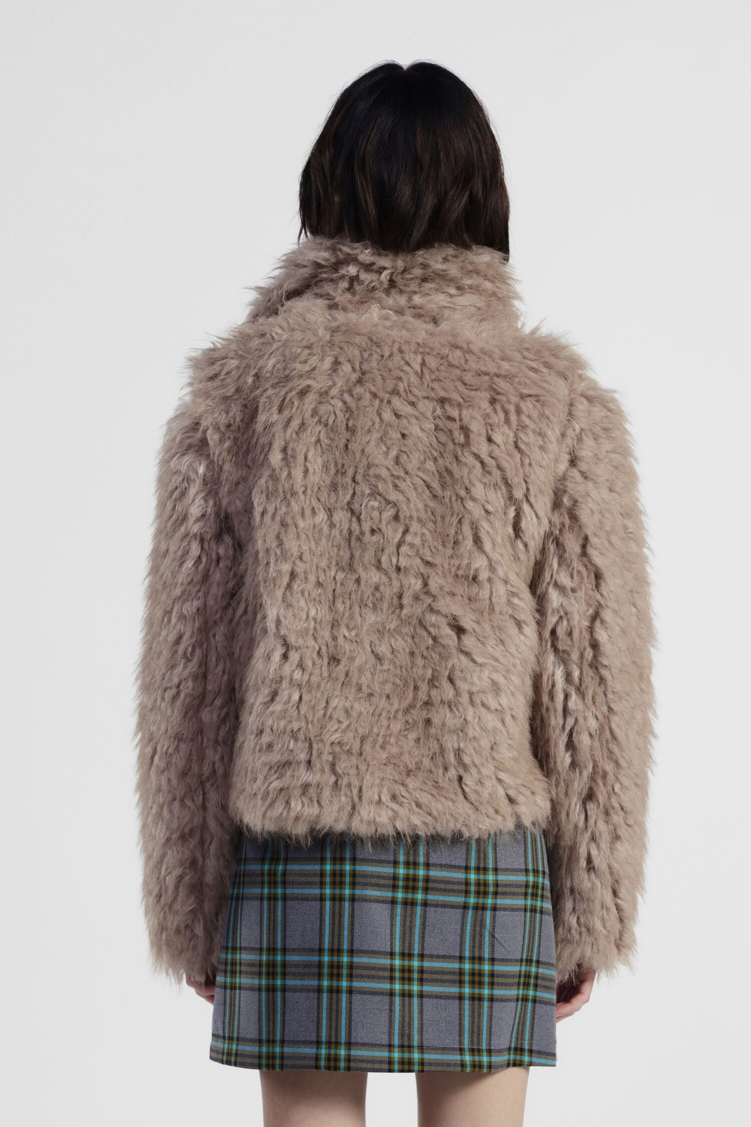 Manteau court en fourrure synthétique Dixie avec fermeture éclair latérale