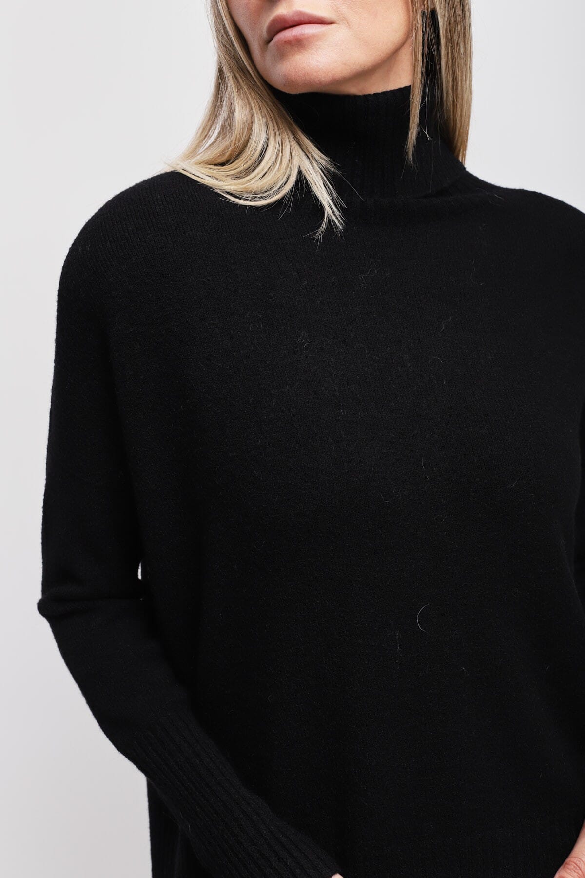 Maryley High Neck Jumper With Asymmetrical Hem