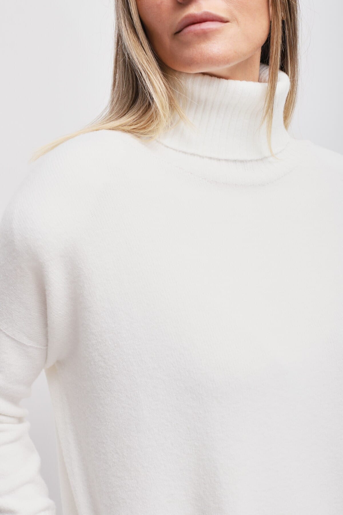 Maryley High Neck Jumper With Asymmetrical Hem