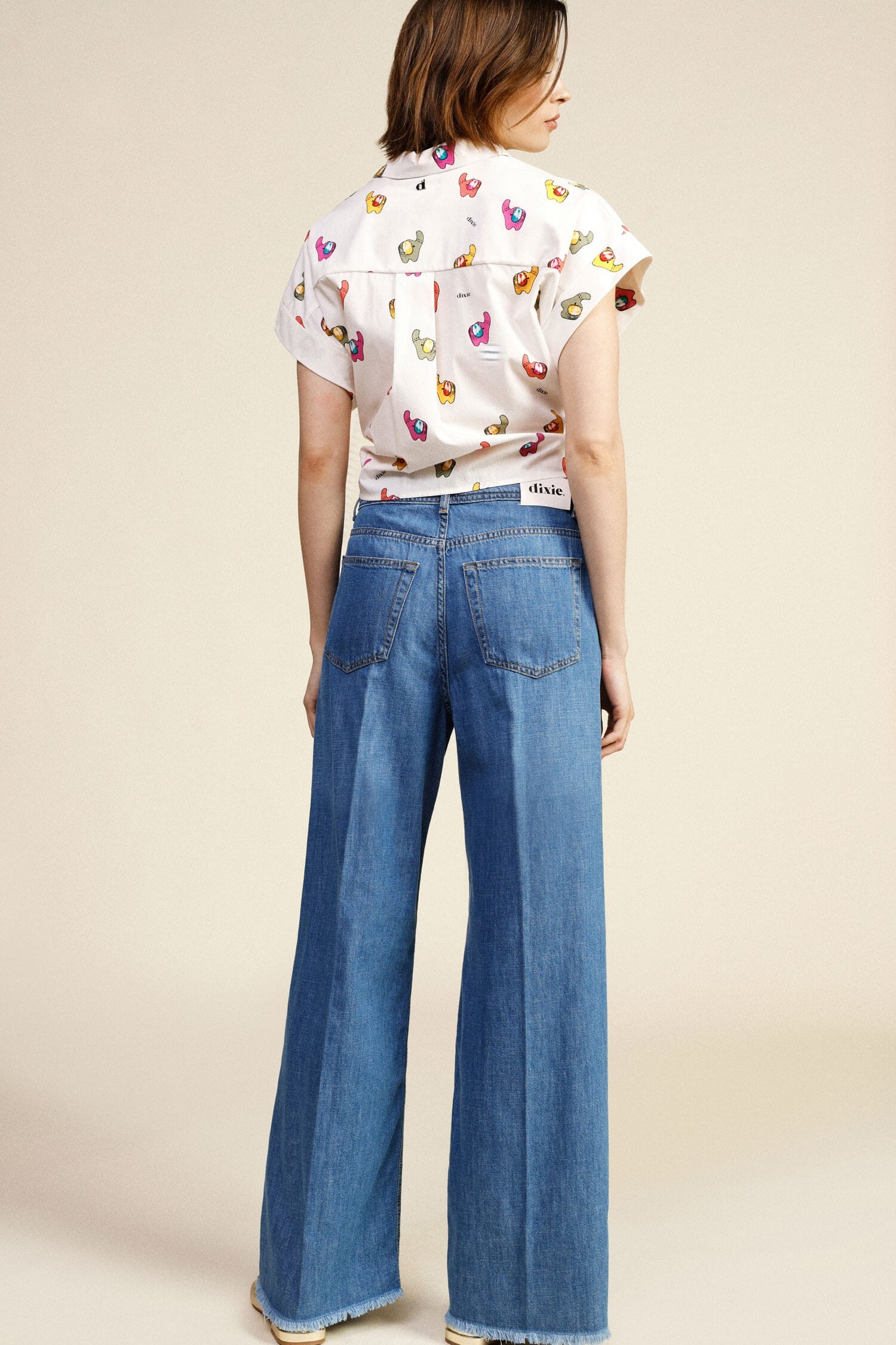 Jeans A Gamba Larga Con Frange Dixie