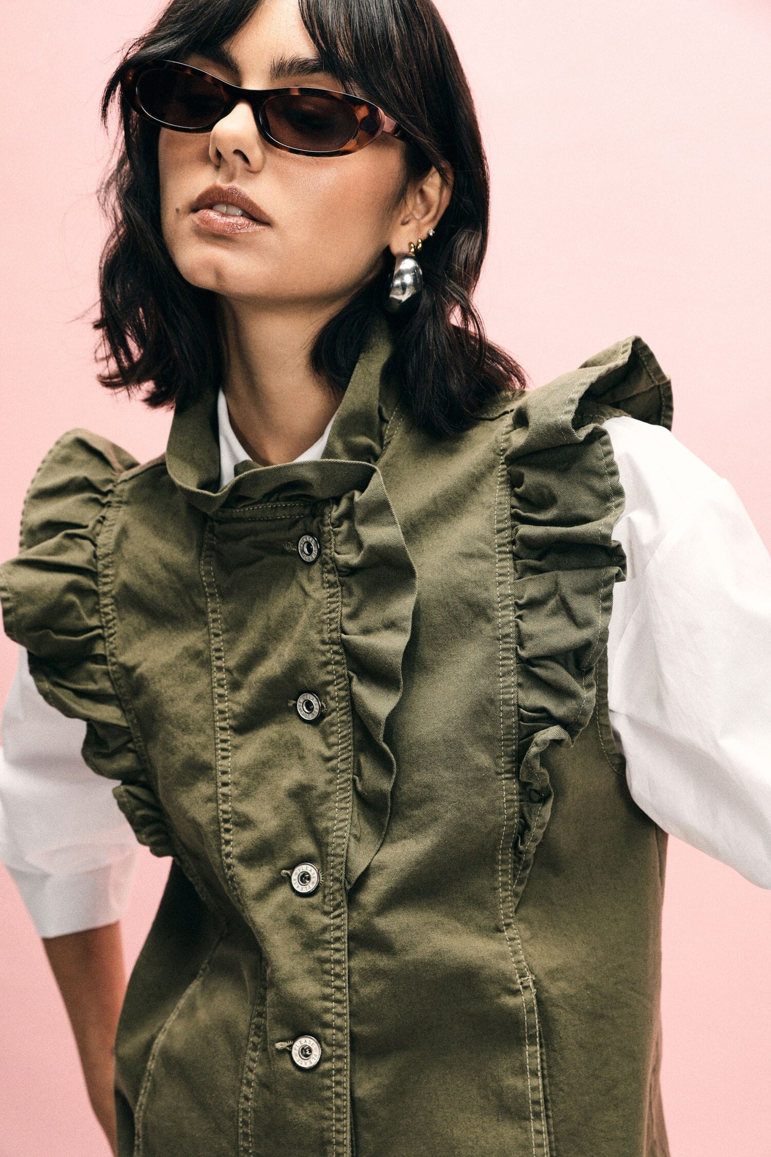 Sleeveless Vest With Front Ruffles Please