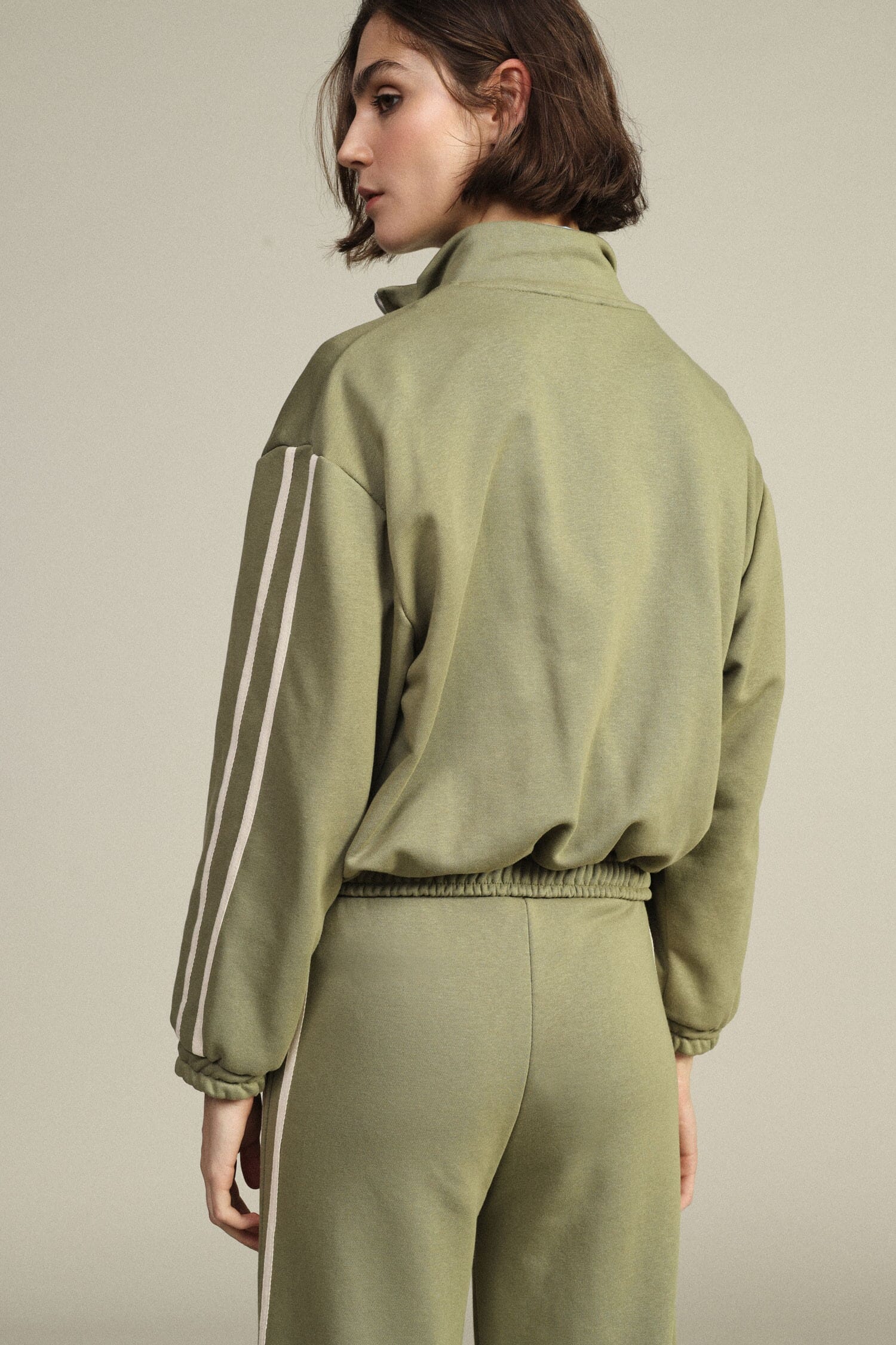 Sweatshirt avec fermeture éclair sur le devant et lacets décoratifs Dixie